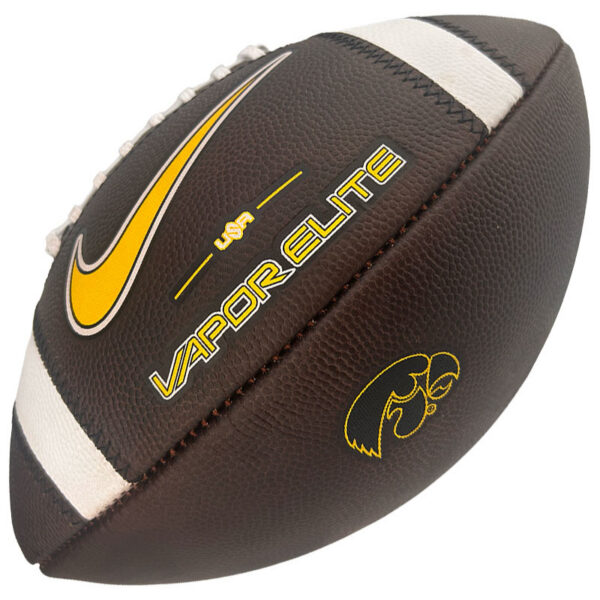 Brown leather football with white laces and two white stripes, featuring a yellow Nike swoosh and the words 'VAPOR ELITE' along the panel, plus a small yellow logo near the seam