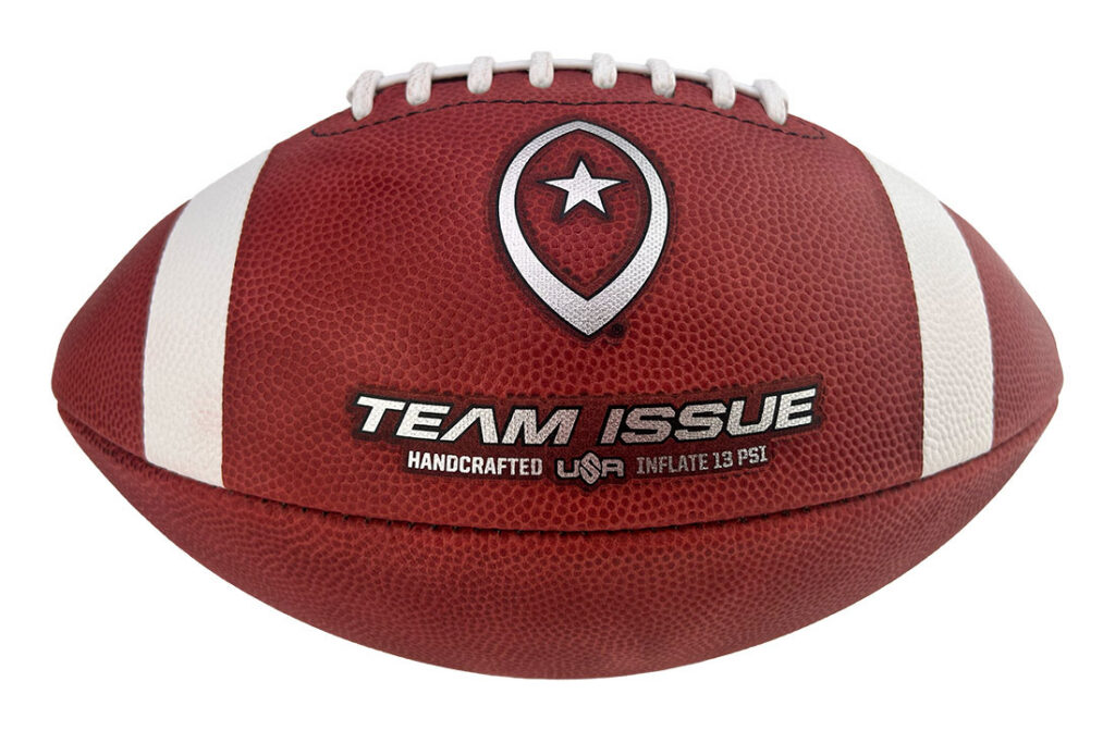 Red leather football with white laces and stripes, branded 'TEAM ISSUE' and a circular logo above it, product shot.