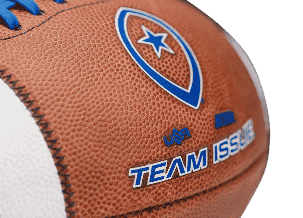 close up image with transparent background of Team Issue football with blue laces and lettering