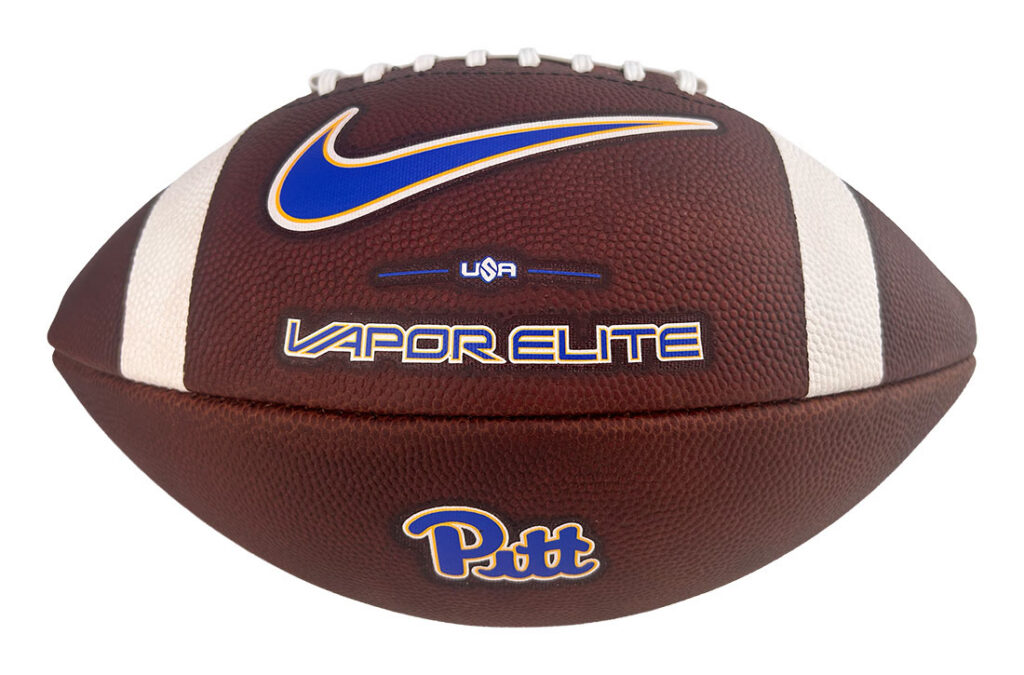 Brown football with white laces and stripes, featuring a blue/orange Nike swoosh and 'Pitt' logo; labeled Vapor Elite USA.