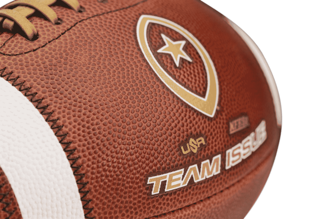 Close up image of Team Issue football with gold laces and lettering