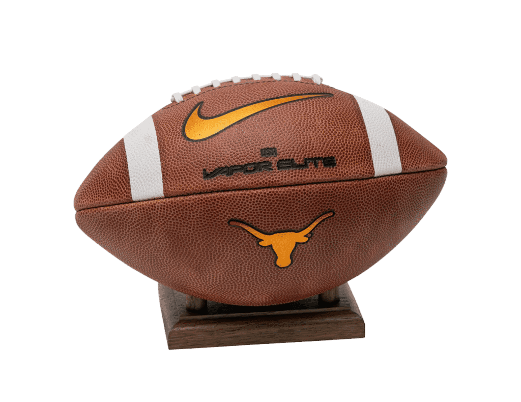 Texas Longhorns Vapor Elite football on wooden display stand