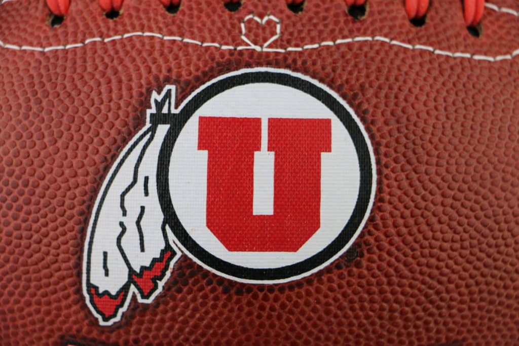 close up of Utah Utes logo on football