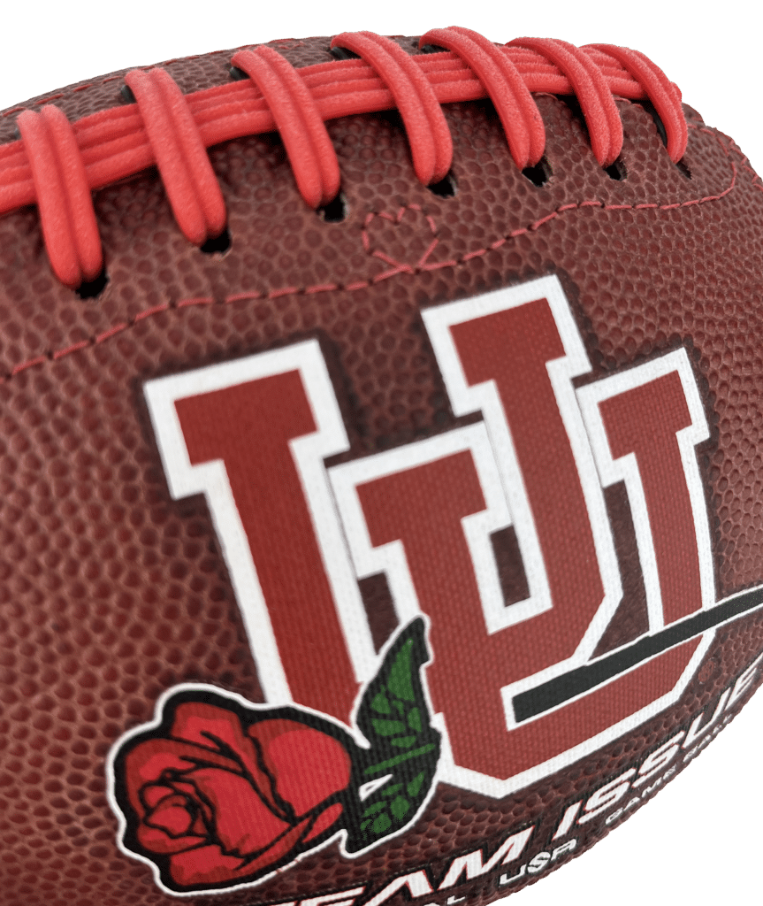 Close up of logo on Team Issue University of Utah ball with red rose