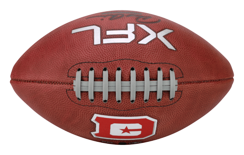 Top view of football with red and white D.C. Defenders logo and XFL logo