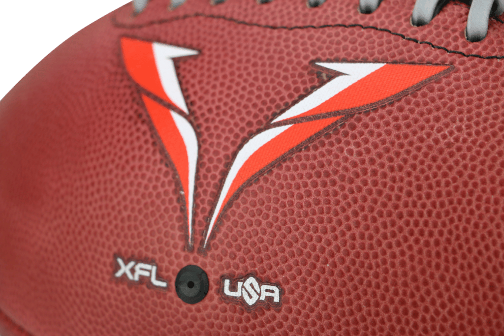 Close up of orange and white Vegas Vipers logo on football for XFL