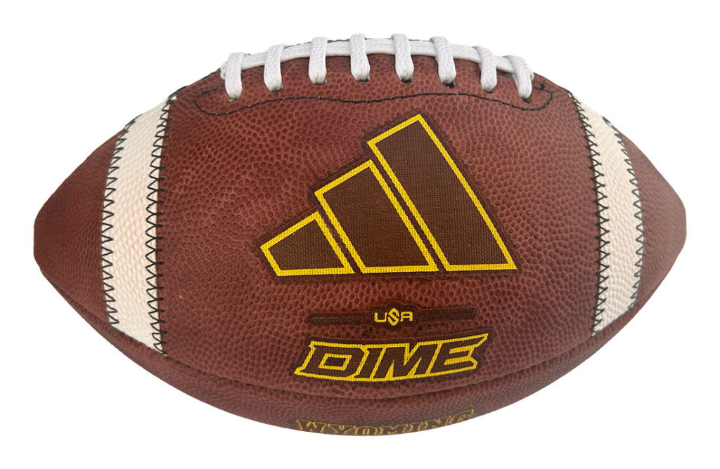 American football with white laces, brown leather, and a yellow Adidas logo beside DIME branding.
