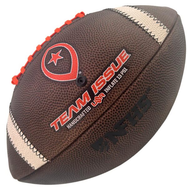 Close-up of a brown leather football with red laces and Team Issue branding visible on the surface.