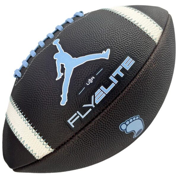 American football with blue laces, a blue Jumpman silhouette, and Fly Elite USA branding on a dark brown ball.