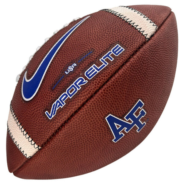 Brown leather American football with white laces, blue Nike swoosh, and 'Vapor Elite' branding.