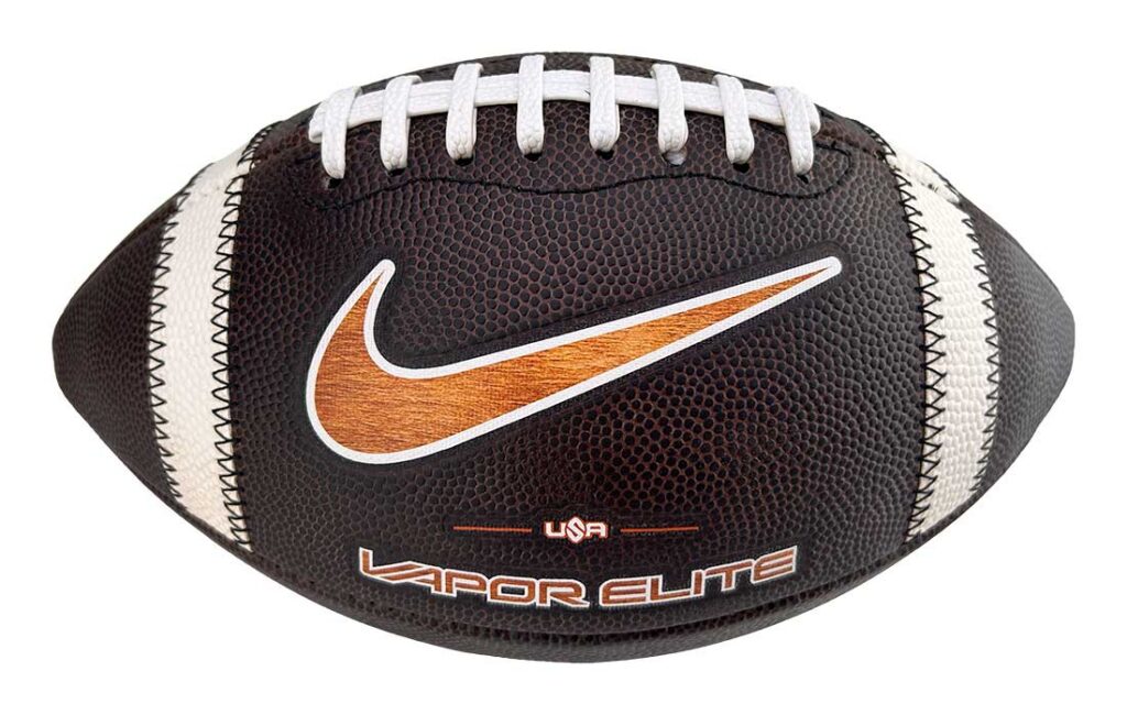 Nike Vapor Elite football with a brown pebbled surface, white laces, and an orange swoosh on the side.