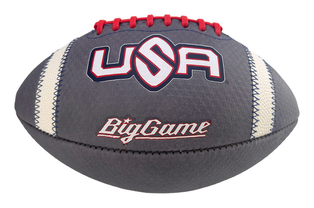 Football with USA logo and 'Big Game' branding, gray panels, white laces, red stitching.